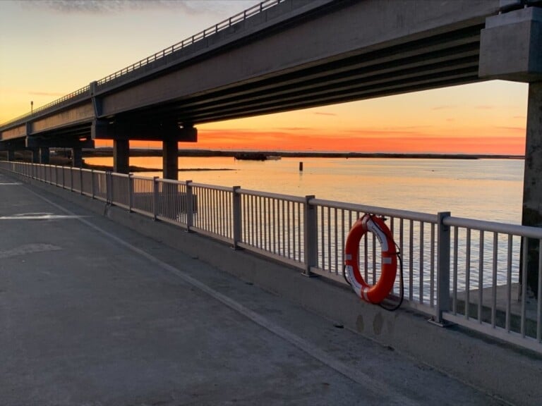 Sunrise over Oregon Inlet from the railing of the Bonner Bridge Pier