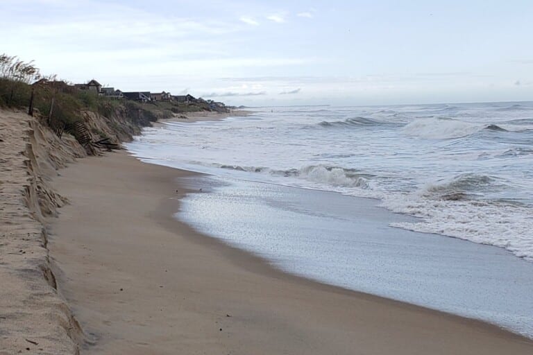 Wide surf running high on the beach toward the dune line south of ORV Ramp 38 near Avon on Hatteras Island