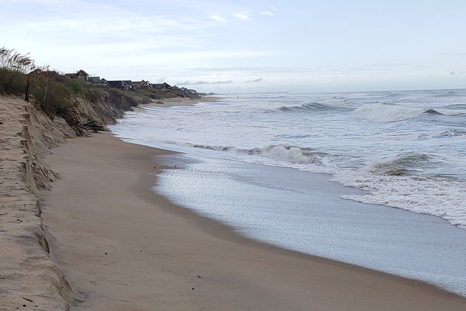 Wide surf running high on the beach toward the dune line south of ORV Ramp 38 near Avon on Hatteras Island